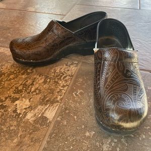 Beautiful tooled leather clogs